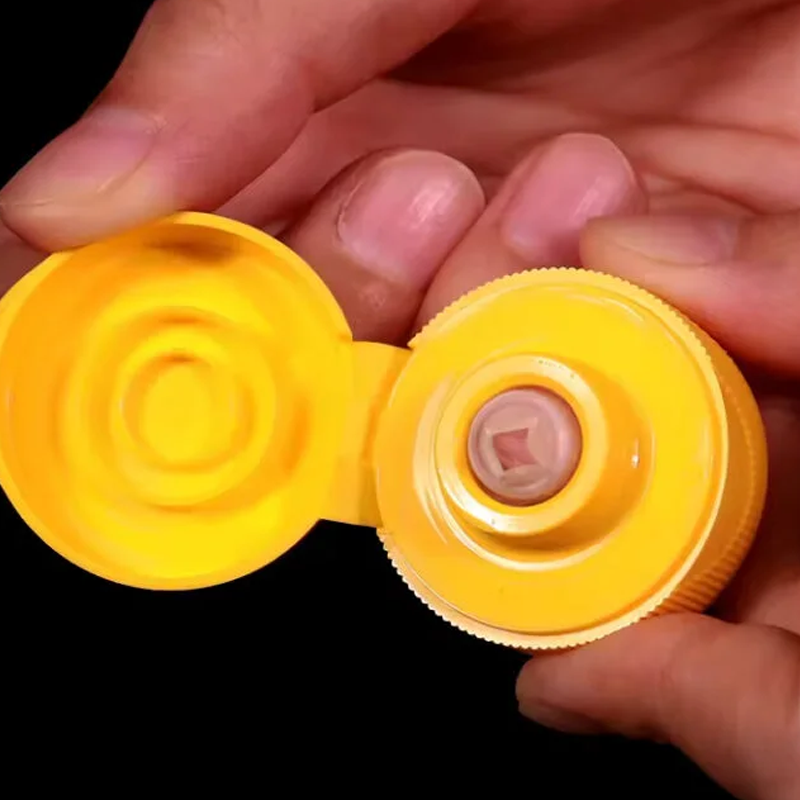 Flip-Top Caps Fitted with Silicone Dispensing Valves1